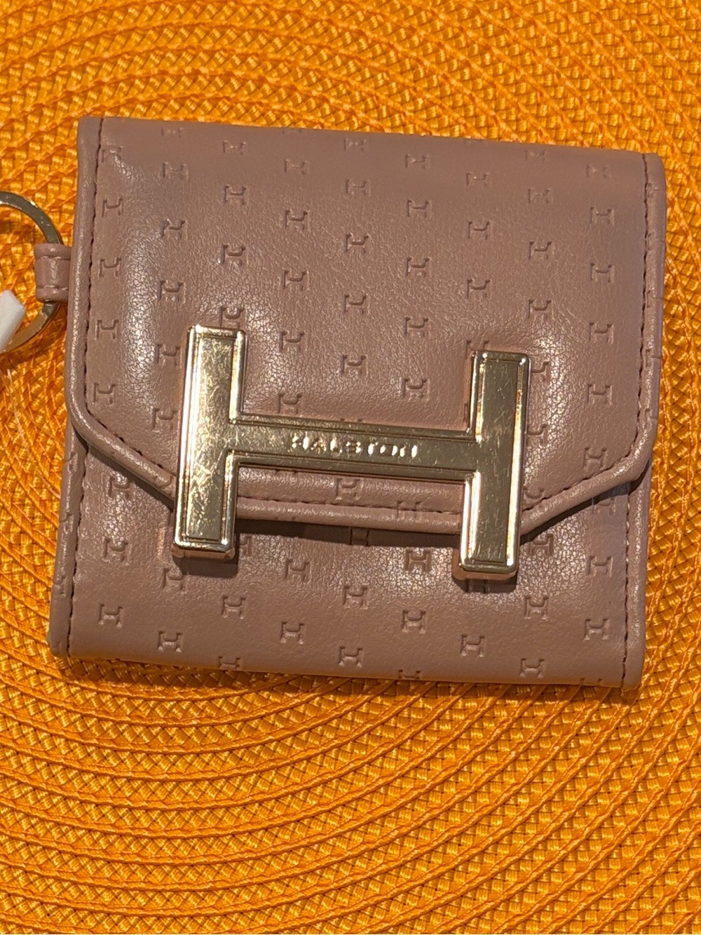Halston Heritage mauve embossed leather bifold wallet